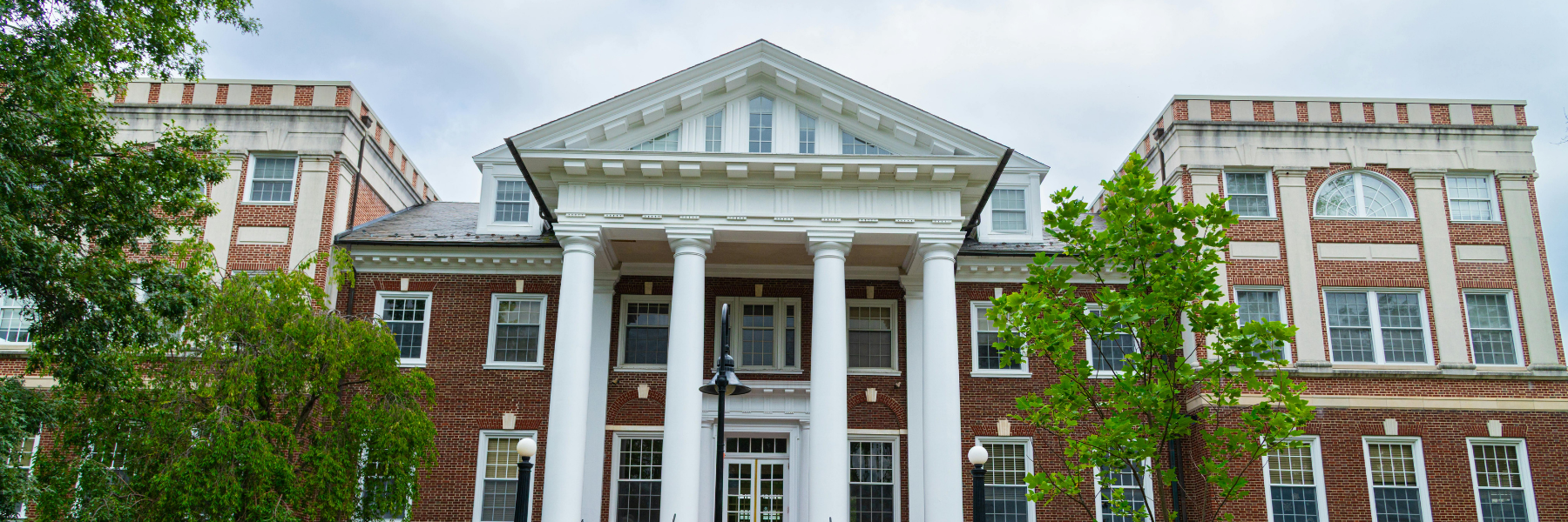 Well-maintained school building exterior with masonry and façade preservation