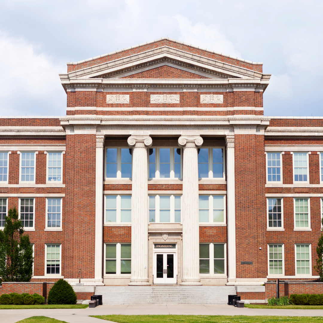 Historic private school building with masonry façade and roof in New York