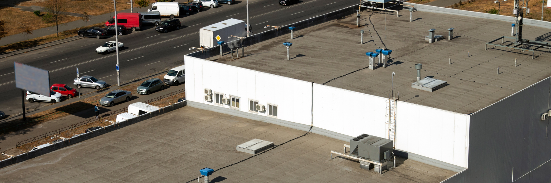 Commercial flat roof suitable for restoration as an alternative to full commercial roof replacement