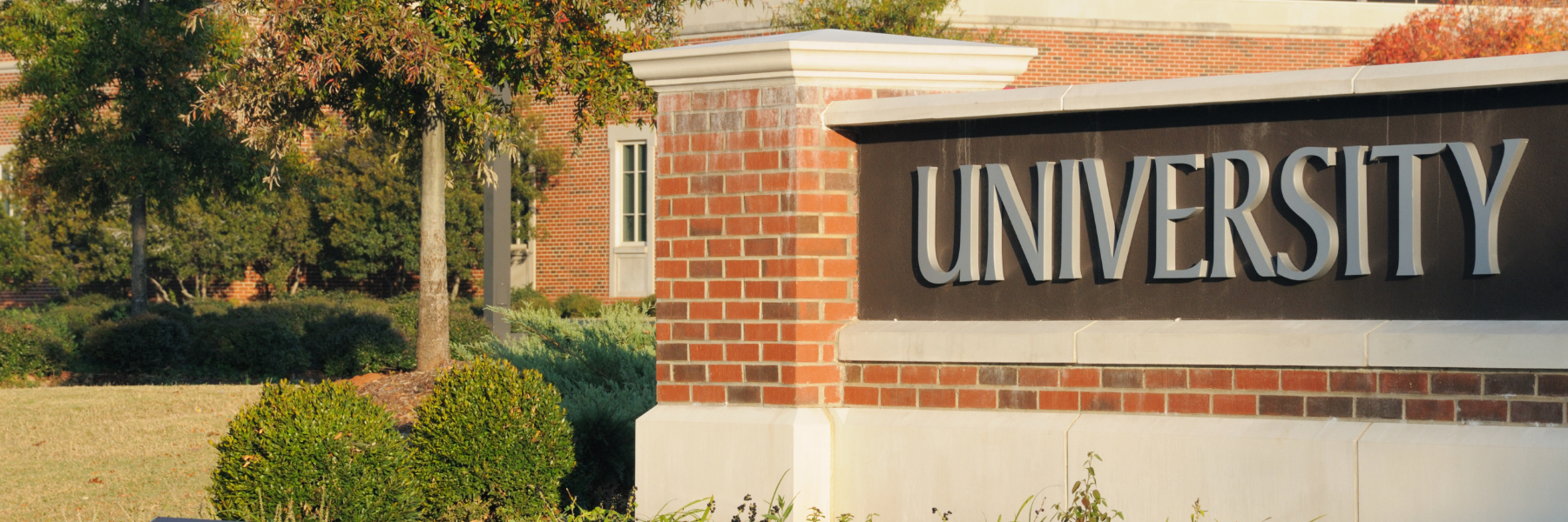 Aging school building exterior with masonry and façade deterioration